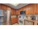Well-equipped kitchen with stainless steel appliances and plenty of cabinet space at 1815 Hawthorne Ln, Burlington, NC 27215