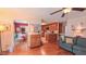 Cozy living room boasts an open layout, connecting to the kitchen and den at 1815 Hawthorne Ln, Burlington, NC 27215