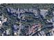 Aerial view of the neighborhood surrounded by lush greenery at 1851 Trailwood Heights Ln, Raleigh, NC 27603