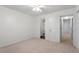 Bright bedroom showcases carpet, closet and connects to an en-suite bathroom for added convenience at 1851 Trailwood Heights Ln, Raleigh, NC 27603
