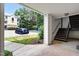 View of parking area with stairs leading up to units at 1851 Trailwood Heights Ln, Raleigh, NC 27603