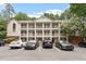 Building exterior showcasing its multiple balconies and parking at 1851 Trailwood Heights Ln, Raleigh, NC 27603