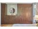 Bright bedroom featuring modern wood storage cabinets, drawers, and clean, minimalist decor at 19 Learned Pl, Durham, NC 27705
