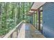 Spacious deck showcasing contemporary design and views of the natural wooded surroundings at 19 Learned Pl, Durham, NC 27705