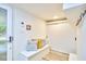 Entryway features hardwood floors, a bench with decorative pillows, and a closet at 19 Learned Pl, Durham, NC 27705