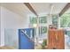 Open Staircase with modern railing design and views of the wooded lot at 19 Learned Pl, Durham, NC 27705