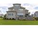 Well-maintained backyard with a spacious deck and lush green lawn at 200 Baskerville Ct, Holly Springs, NC 27540