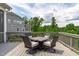 Deck with seating area offers outdoor dining and relaxation at 200 Baskerville Ct, Holly Springs, NC 27540