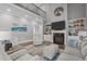 Cozy living room area featuring a fireplace, TV, and comfortable seating, perfect for relaxation at 204 Franconia Way, Apex, NC 27502
