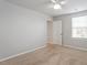 Bedroom with neutral walls, and natural light from one large window at 212 Sea Trail St, Hillsborough, NC 27278