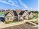 Stunning clubhouse featuring detailed architecture and well-maintained landscaping, surrounded by ample parking spots at 212 Sea Trail St, Hillsborough, NC 27278