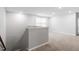 Hallway and staircase featuring neutral paint and neutral-colored carpeting at 212 Sea Trail St, Hillsborough, NC 27278