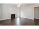 Living room with fireplace and door to the backyard at 212 Sea Trail St, Hillsborough, NC 27278