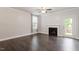 Living room features hardwood floors and a fireplace at 212 Sea Trail St, Hillsborough, NC 27278