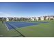 Neighborhood tennis courts surrounded by beautiful homes at 212 Sea Trail St, Hillsborough, NC 27278