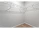 Walk-in closet featuring wire shelving, neutral walls, and carpet at 212 Sea Trail St, Hillsborough, NC 27278