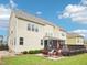 A spacious backyard with a large deck and seating area, perfect for entertaining at 214 Ashdown Forest Ln, Cary, NC 27519