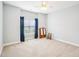 Neutral bedroom with carpet and a window, offering a versatile space for personalization at 214 Ashdown Forest Ln, Cary, NC 27519