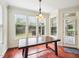 Breakfast area with table and windows overlooking the backyard at 214 Ashdown Forest Ln, Cary, NC 27519