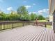 Large wooden deck overlooking the expansive backyard, perfect for outdoor entertaining at 214 Ashdown Forest Ln, Cary, NC 27519