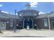 Well-maintained brick clubhouse with manicured landscaping and accessible entrance, perfect for community events at 214 Ashdown Forest Ln, Cary, NC 27519