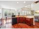 Beautiful kitchen with cherry cabinets, granite countertops and stainless steel appliances at 214 Ashdown Forest Ln, Cary, NC 27519