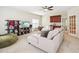 Inviting living room featuring a comfortable sectional sofa and a built-in wet bar at 214 Ashdown Forest Ln, Cary, NC 27519