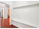 Mudroom with built in bench, coat hooks and easy access to a bathroom at 214 Ashdown Forest Ln, Cary, NC 27519
