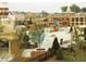 Community pool area with a slide and kid play area and lounge chairs at 214 Ashdown Forest Ln, Cary, NC 27519