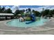 View of a community pool featuring a water play area and ample space for recreational swimming at 214 Ashdown Forest Ln, Cary, NC 27519