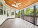 Relaxing screened porch with wood ceiling and flooring, perfect for enjoying the outdoors at 214 Ashdown Forest Ln, Cary, NC 27519