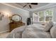 Bedroom featuring soft lighting, carpet flooring, and neutral tones at 218 Kinvara Ct, Wake Forest, NC 27587