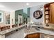 Open concept kitchen featuring granite countertops, modern appliances, and view of living room at 218 Kinvara Ct, Wake Forest, NC 27587