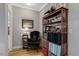 Office with built in wood bookshelves and reading nook at 218 Kinvara Ct, Wake Forest, NC 27587
