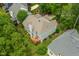 Aerial view of a lovely home featuring a wooden deck and spacious backyard at 221 Roebling Ln, Cary, NC 27513
