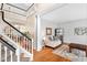 Spacious foyer with hardwood floors and staircase leading to second level at 221 Roebling Ln, Cary, NC 27513