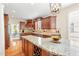 Spacious kitchen with granite island, stainless steel appliances, and breakfast area at 221 Roebling Ln, Cary, NC 27513