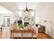Bright living room with vaulted ceiling, fireplace, and large windows at 221 Roebling Ln, Cary, NC 27513