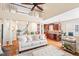 Open living space with hardwood floors, fireplace, and easy access to kitchen at 221 Roebling Ln, Cary, NC 27513