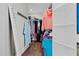 Walk-in closet with storage racks and rods offering plenty of space for clothing and accessories at 2229 Neills Creek Rd, Lillington, NC 27546