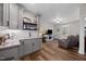 Spacious living room with a wet bar, seamlessly connected to the relaxation area with comfortable seating at 2229 Neills Creek Rd, Lillington, NC 27546