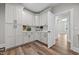 Well-organized pantry with white cabinets and drawers, offering ample storage and counter space at 2229 Neills Creek Rd, Lillington, NC 27546