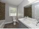 Stylish bathroom featuring a double sink vanity, mosaic tile accents, and a neutral color scheme at , Holly Springs, NC 27540