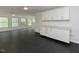 Versatile bonus room with marble countertops, bright white cabinets, a wet bar, and natural light at , Holly Springs, NC 27540