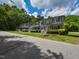 Charming townhomes with classic architectural details, inviting front porch and lush landscaping at , Holly Springs, NC 27540