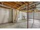 Unfinished basement with utility fixtures, a shower stall, and a window offering natural light at 2291 Gentry Ridge Rd, Roxboro, NC 27574