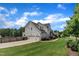 Spacious home with a three-car garage, large backyard and a meticulously kept lawn at 2300 Ginger Gold Court, Apex, NC 27539