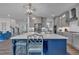 Spacious eat-in kitchen with an island, marble countertops, stainless appliances, and open floor plan at 2300 Ginger Gold Court, Apex, NC 27539