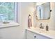 Bright bathroom features a single sink vanity and a window with lots of light at 2334 Dawn Trl, Durham, NC 27712