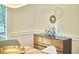 Dining room with a wood cabinet and decorative wall art at 2334 Dawn Trl, Durham, NC 27712